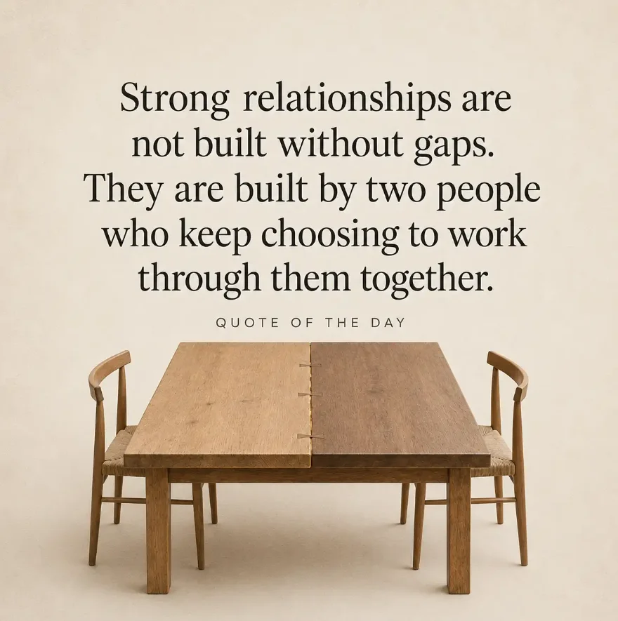 Two wooden chairs beside a dining table with a visible center seam, beneath a quote about building strong relationships together.